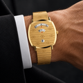 Gucci Grip 38mm Quartz Men's Watch – Gold PVD – YA157409 worn on wrist