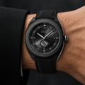 Gucci YA142330 black automatic watch worn on wrist