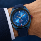 Gucci YA142331 blue automatic watch worn on wrist