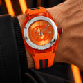 Gucci Sync XXL YA137108 orange men's watch on wrist