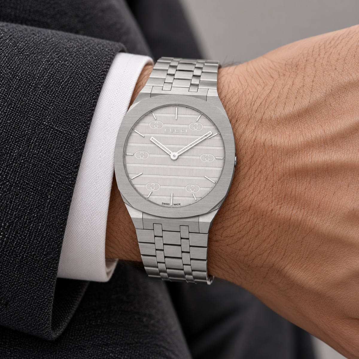 Gucci 25H YA163407 silver watch worn on wrist