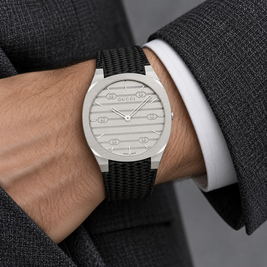 Gucci 25H YA163419 silver watch worn on wrist