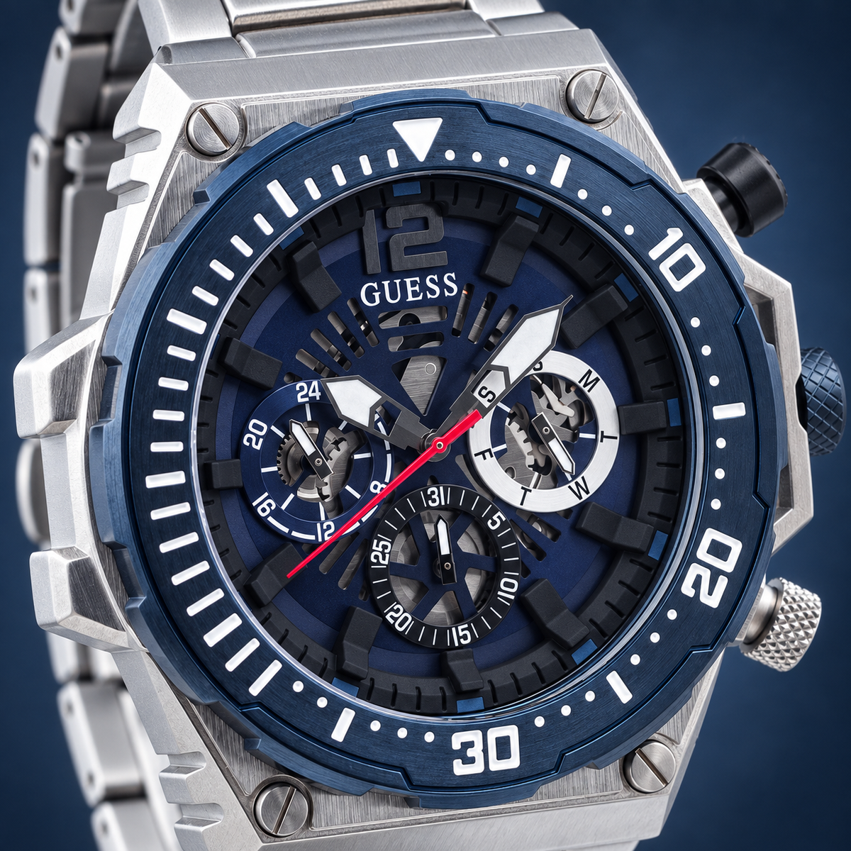 GUESS Exposure Men's Blue Silver-Tone Multi-function Watch – Exposure, Blue skeleton-style multi-function dial with red sweep hand, Silver-tone stainless-steel bracelet, 48 mm – GW0324G1 – image 3