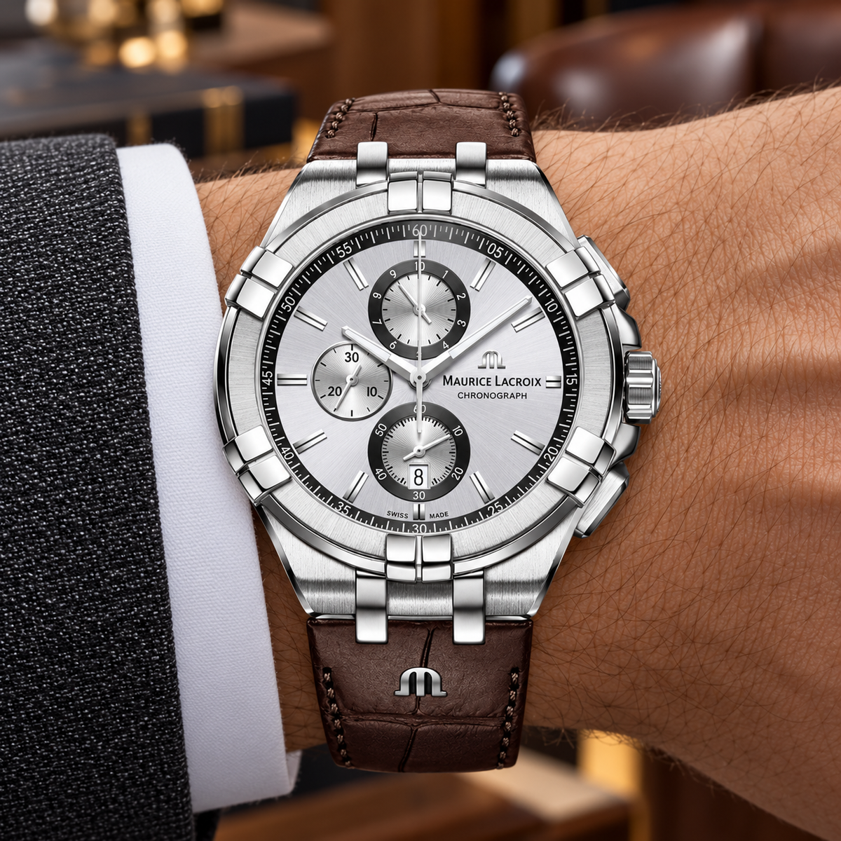 Maurice Lacroix AI1018-SS001-130-1 — men's wrist with premium tailoring