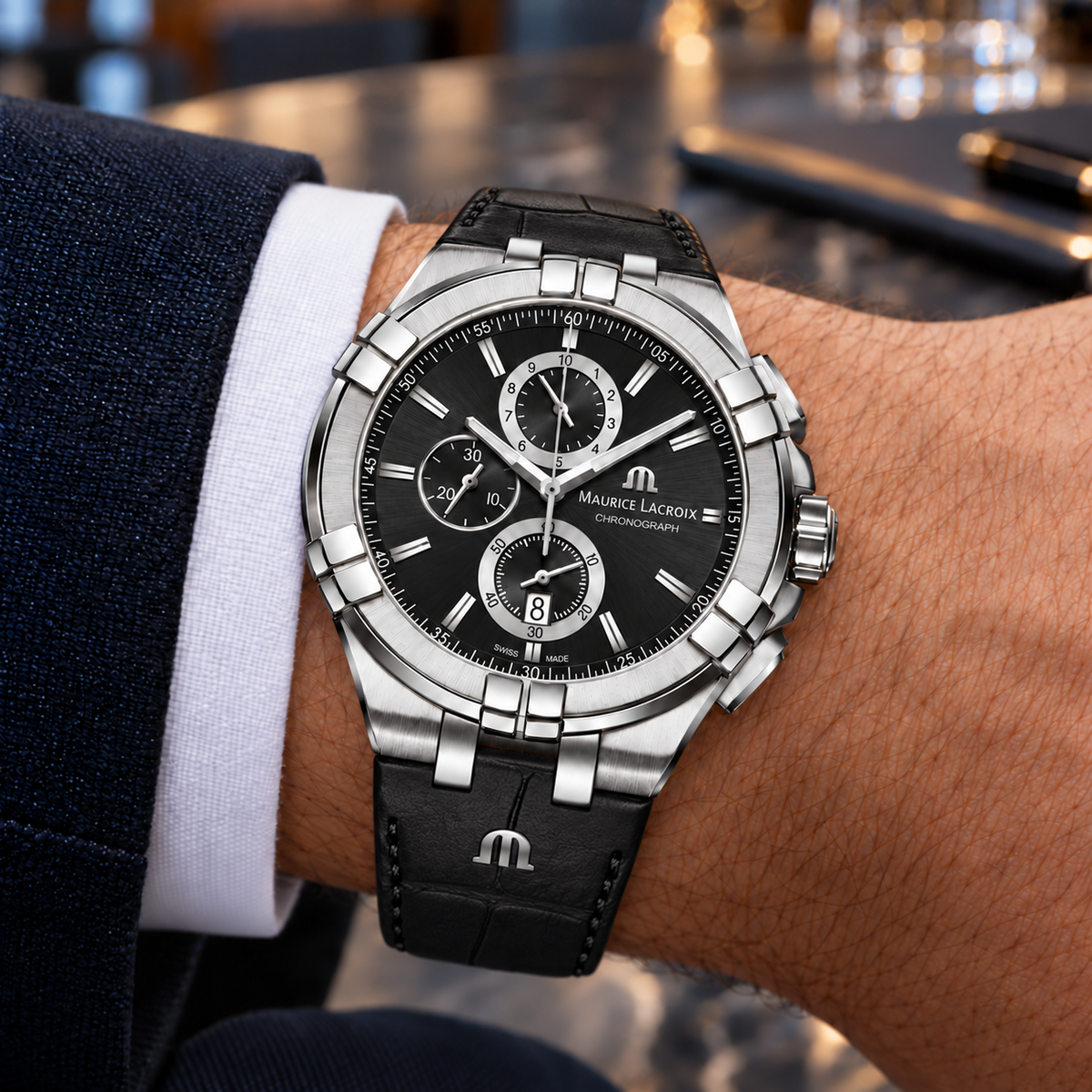 Maurice Lacroix AI1018-SS001-330-1 — men's wrist with premium tailoring