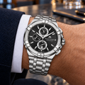 Maurice Lacroix AI1018-SS002-330-1 — on a man's wrist with premium tailoring
