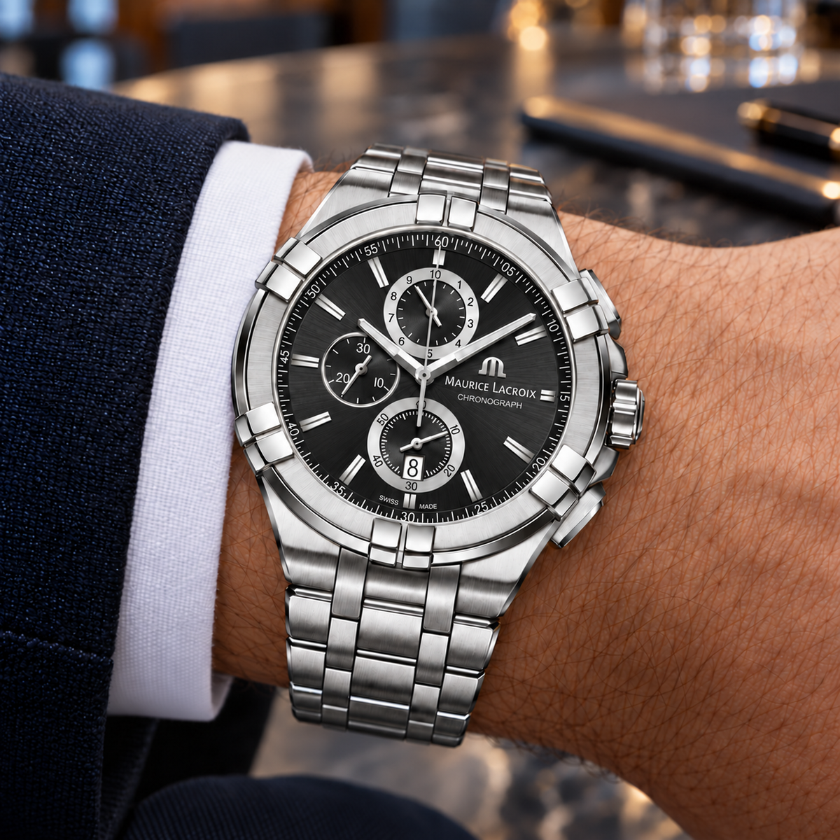 Maurice Lacroix AI1018-SS002-330-1 — on a man's wrist with premium tailoring