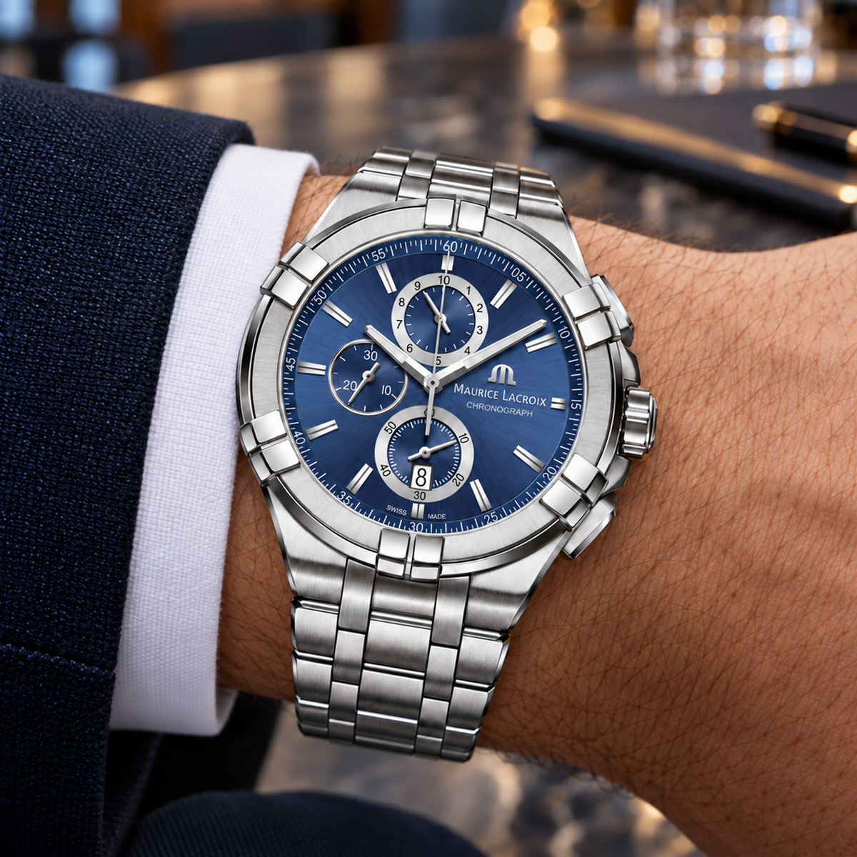 Maurice Lacroix AI1018-SS002-430-1 — on a man's wrist with premium tailoring