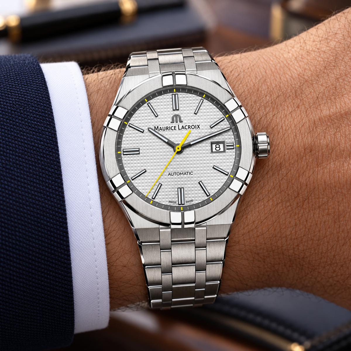 Maurice Lacroix AI6008-SS00F-231-A — men's wrist with premium tailoring