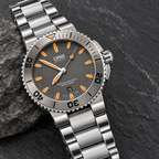 Oris Aquis Date 43mm grey dial orange accents tungsten bezel steel bracelet – slate still life