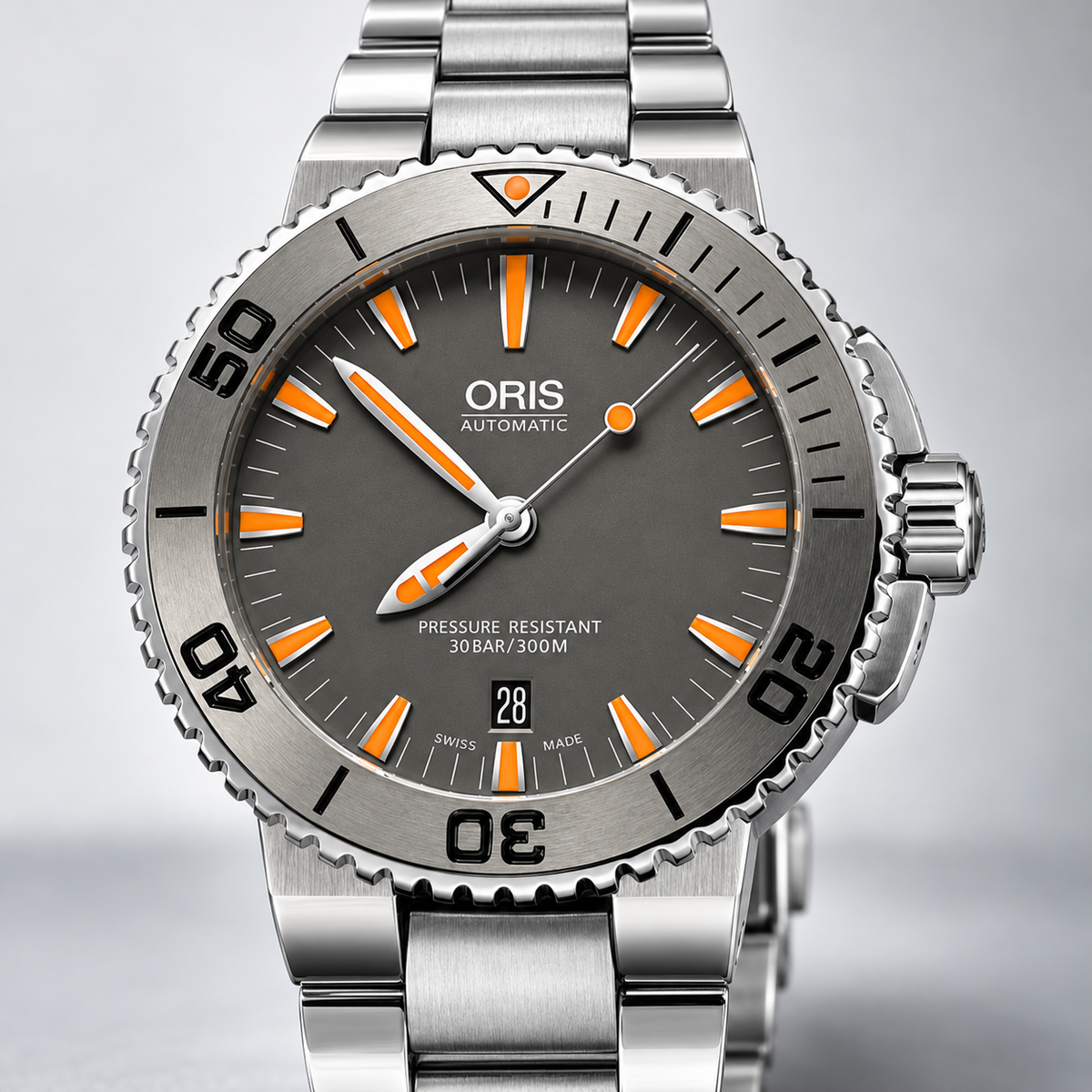 Oris Aquis Date 43mm grey dial orange accents tungsten bezel steel bracelet – dial macro