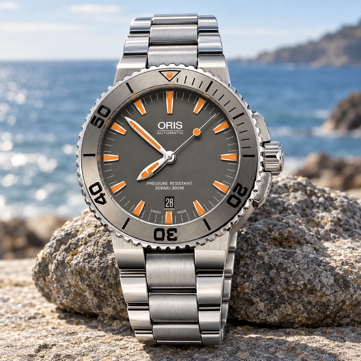 Oris Aquis Date 43mm grey dial orange accents tungsten bezel steel bracelet – coastal lifestyle