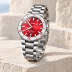 Oris Aquis Date Taste of Summer 41.5mm watermelon-red dial steel bracelet – limestone still life