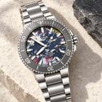 Oris Aquis Date Upcycle 41.5mm pictured multicolor PET dial steel bracelet – stone still life