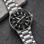 Oris Aquis Date 41.5mm black dial steel bracelet – slate still life