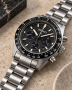 Seiko Prospex Speedtimer SSC819 angled product view on stone
