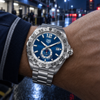 TAG Heuer Formula 1 WAZ2014.BA0842 on wrist at night pit lane
