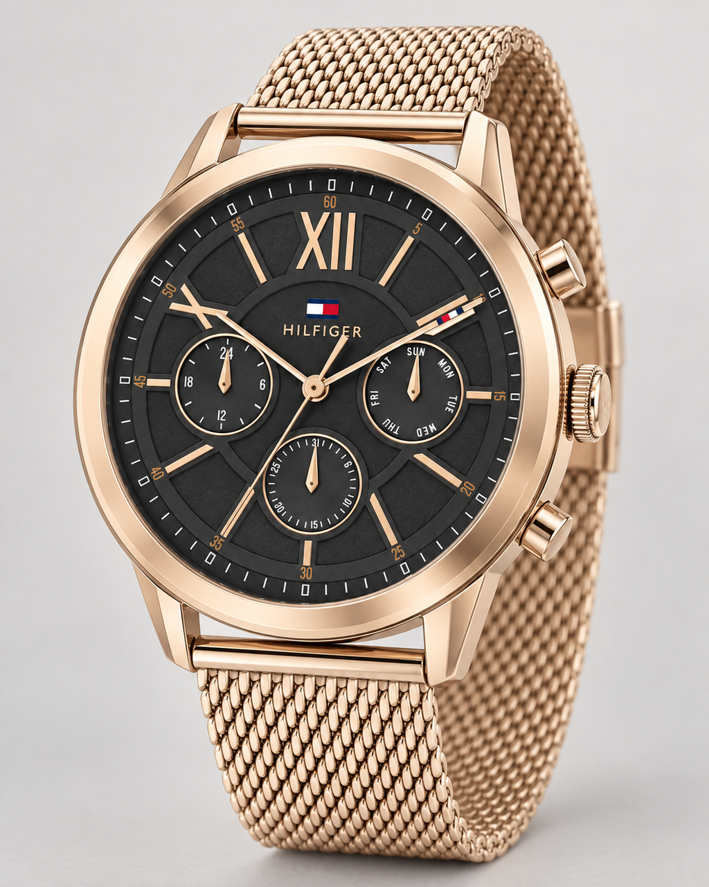 Tommy Hilfiger Morrison Men's Multifunction Watch – Black Dial, Rose Gold Mesh Bracelet, 44mm – 1710525 – three-quarter profile