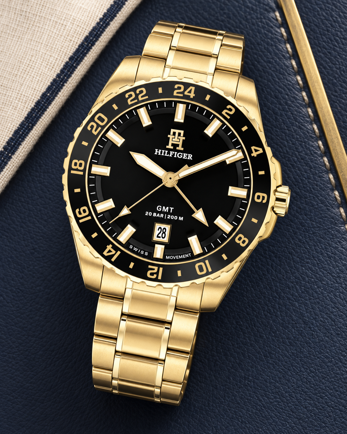 Tommy Hilfiger TH85 GMT Men's Watch – Black Dial, Gold Steel Bracelet, 42mm – 1792133 – luxury flat lay